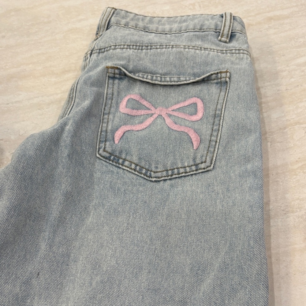 Edikted Light Blue Jeans with Pink Bow Detail